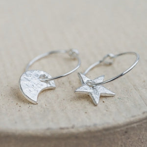 
                  
                    Handmade Sterling Silver Lucy Kemp Jewellery Star and Moon Charm classic wire Hoops
                  
                