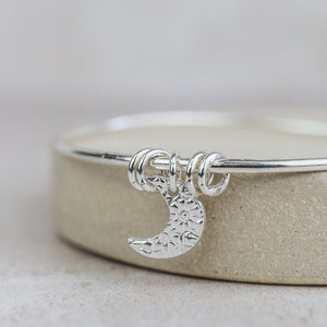 
                  
                    sterling silver textured moon bangle
                  
                