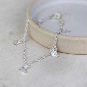 
                  
                    sterling silver moon bracelet handmade by Lucy Kemp Jewellery
                  
                