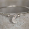 sterling silver textured moon charm bangle handmade by Lucy Kemp Jewellery