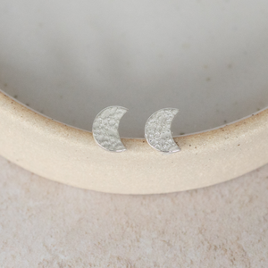 
                  
                    sterling silver textured moon studs by Lucy Kemp Jewellery
                  
                