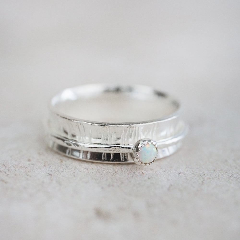 Sterling Silver and opal spinner fidget ring from Lucy Kemp Jewellery 