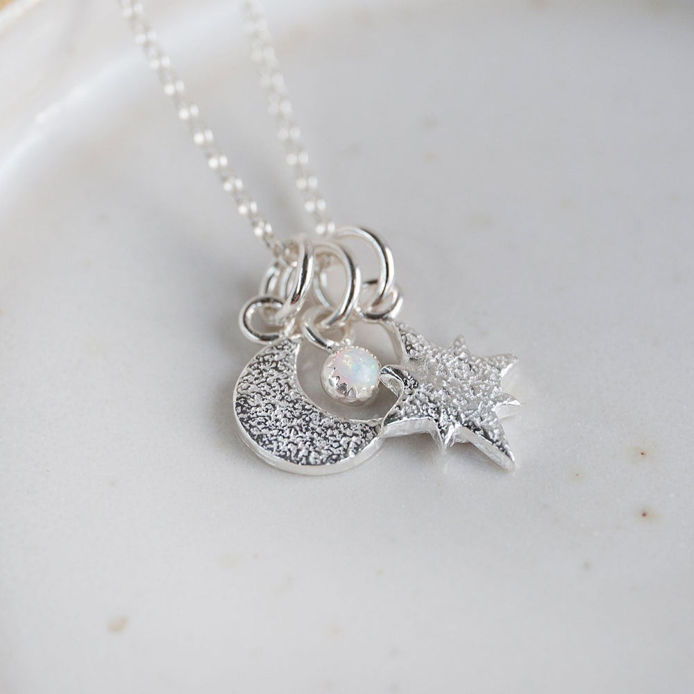 Handmade sterling silver star and moon birthstone cluster necklace by Lucy Kemp Jewellery