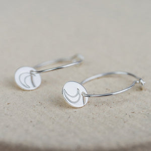 
                  
                    sterling silver stamped open moon hoops
                  
                