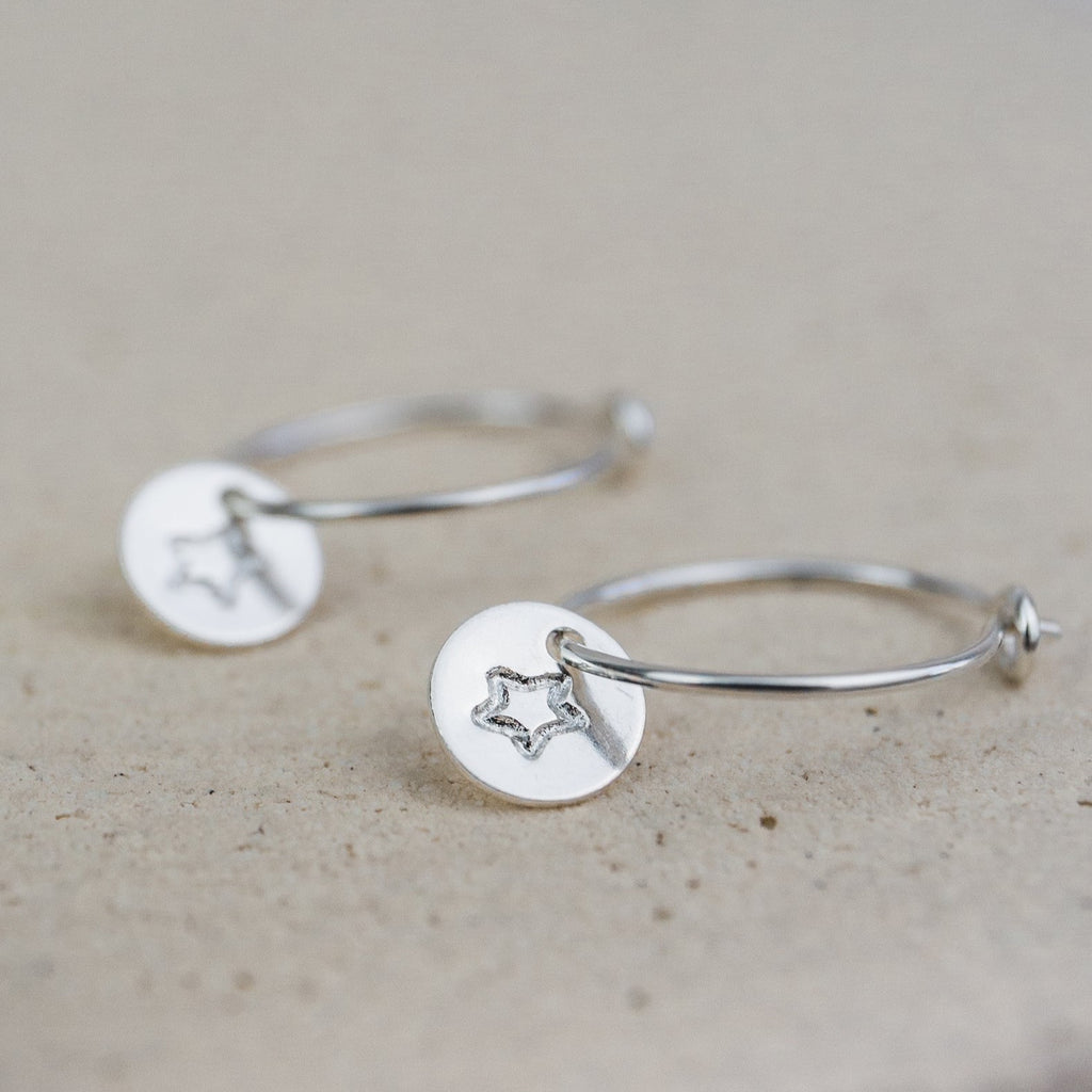 sterling silver stamped open star hoops