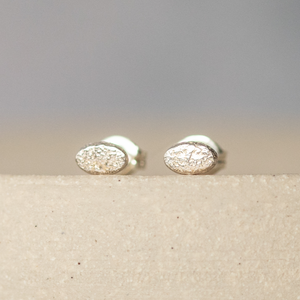 
                  
                    sterling silver mini oval studs handmade  by Lucy Kemp Jewellery
                  
                