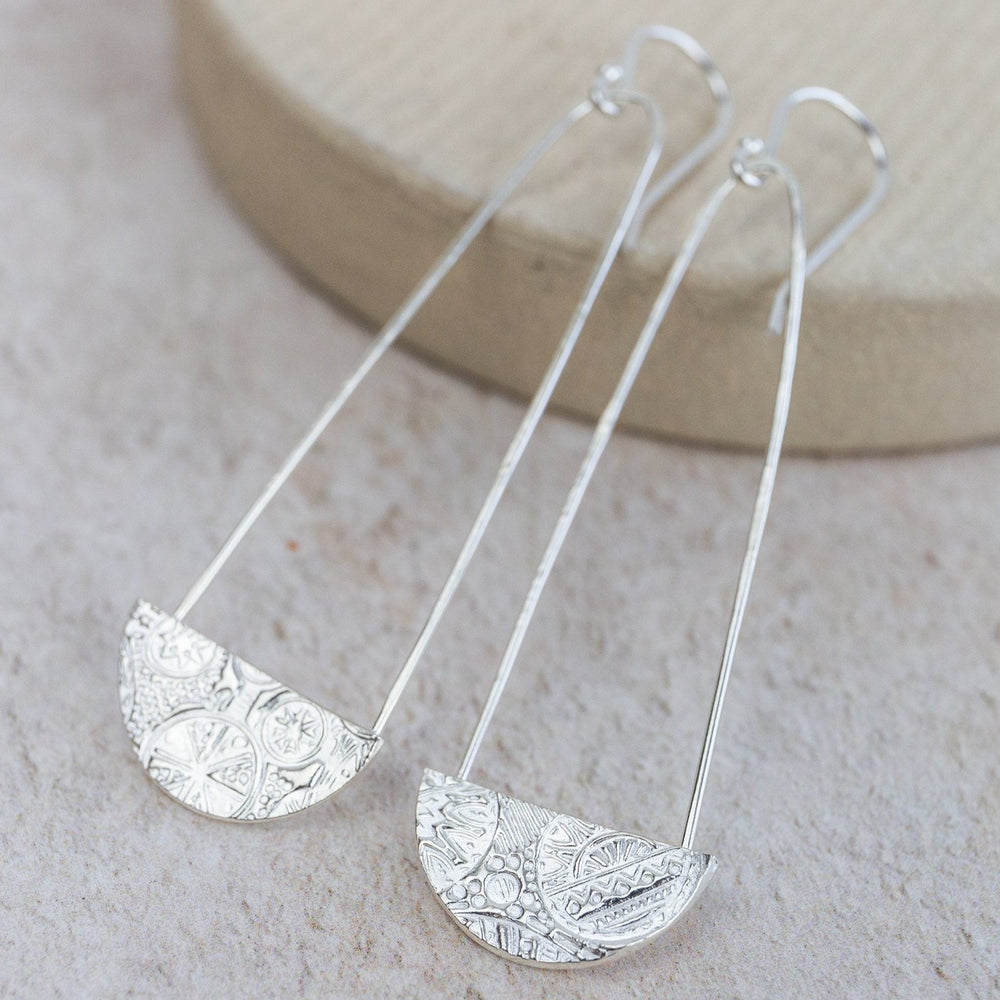 Sterling silver large pendulum earrings handmade by Lucy Kemp Jewellery