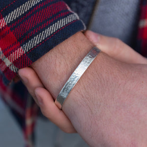 
                  
                    sterling silver personalised engraved cuff for men handmade by Lucy Kemp Jewellery - worn image
                  
                