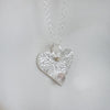 rose quartz heart birthstone pendant by Lucy Kemp jewellery
