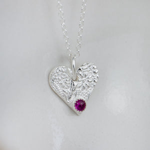 
                  
                    ruby heart birthstone pendant by Lucy Kemp jewellery
                  
                
