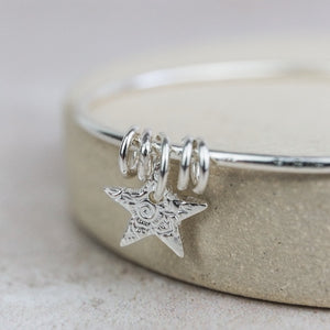 
                  
                    sterling silver textured star bangle
                  
                