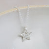 sterling silver small textured star pendant by Lucy Kemp Jewellery