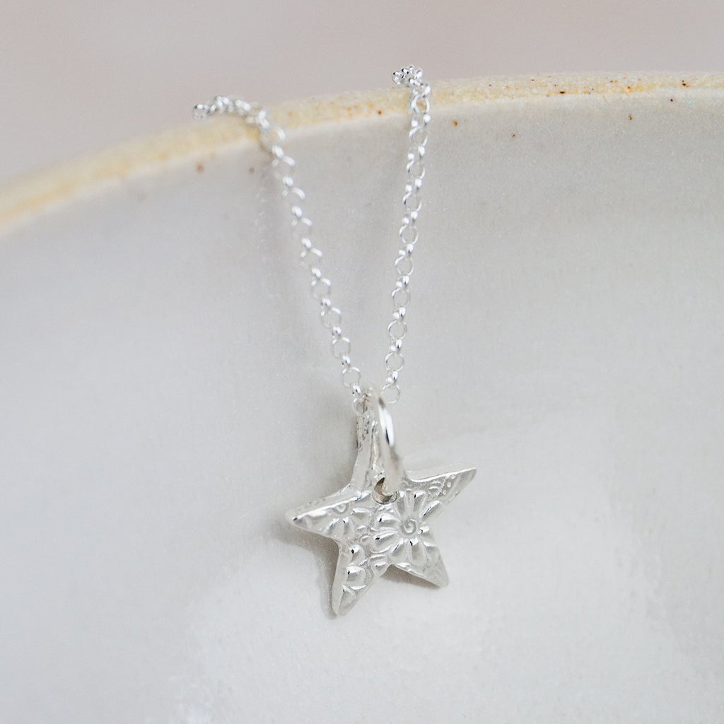 sterling silver small textured star pendant by Lucy Kemp Jewellery