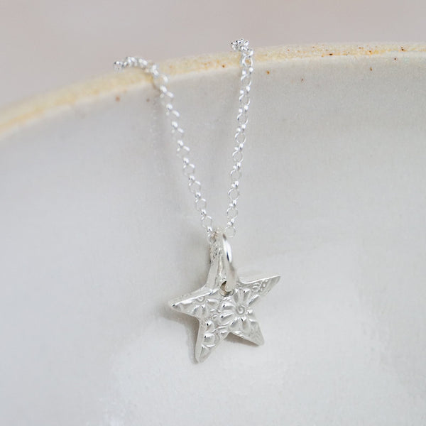sterling silver small textured star pendant by Lucy Kemp Jewellery