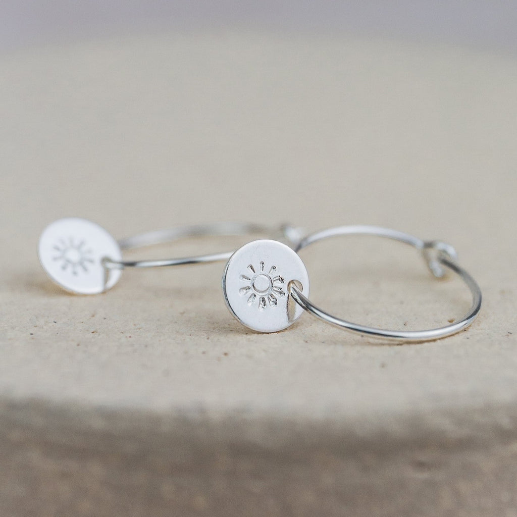 sterling silver stamped sun  hoops