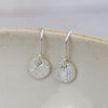 sterling silver mini  textured circle earrings by Lucy Kemp Jewellery