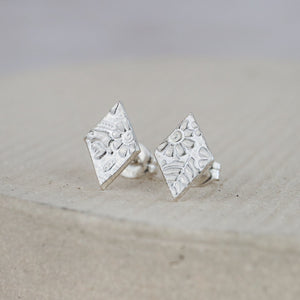 
                  
                    Sterling silver textured diamond studs by Lucy Kemp Jewellery 
                  
                