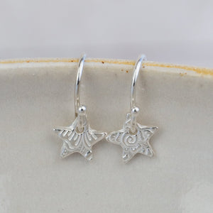 
                  
                    sterling silver mini textured star earrings
                  
                