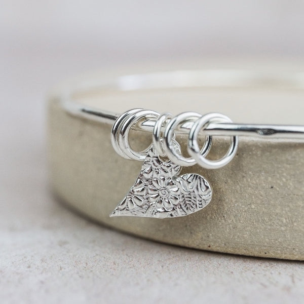 sterling silver textured tilted heart bangle