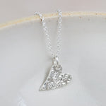 sterling silver small textured tilted heart pendant by Lucy Kemp Jewellery