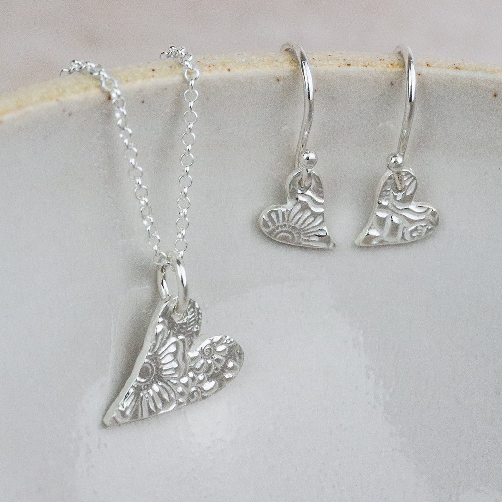 sterling silver small textured tilted heart pendant and earrings set by Lucy Kemp Jewellery